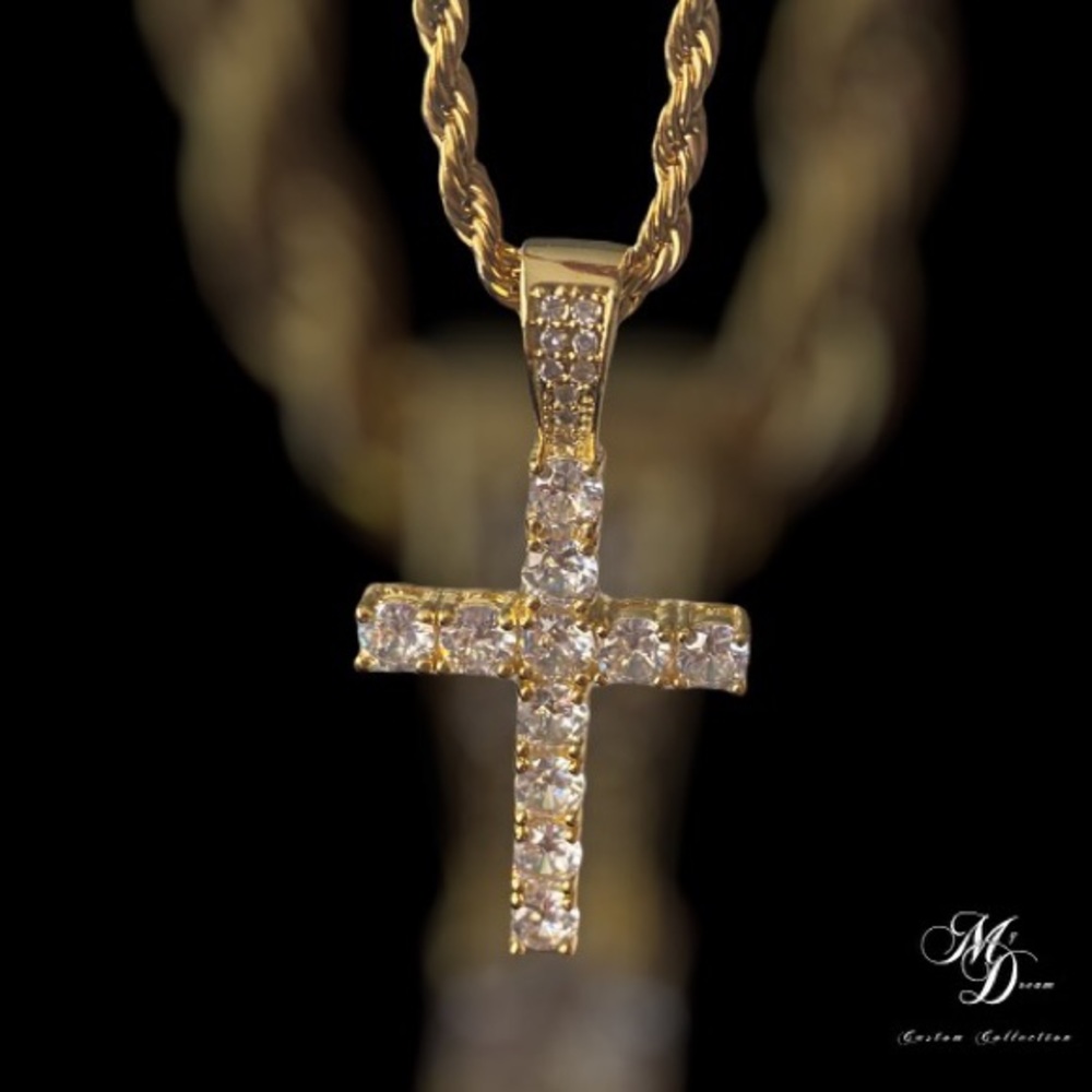 I’m selling a brand new gold cross comes with a dust bag